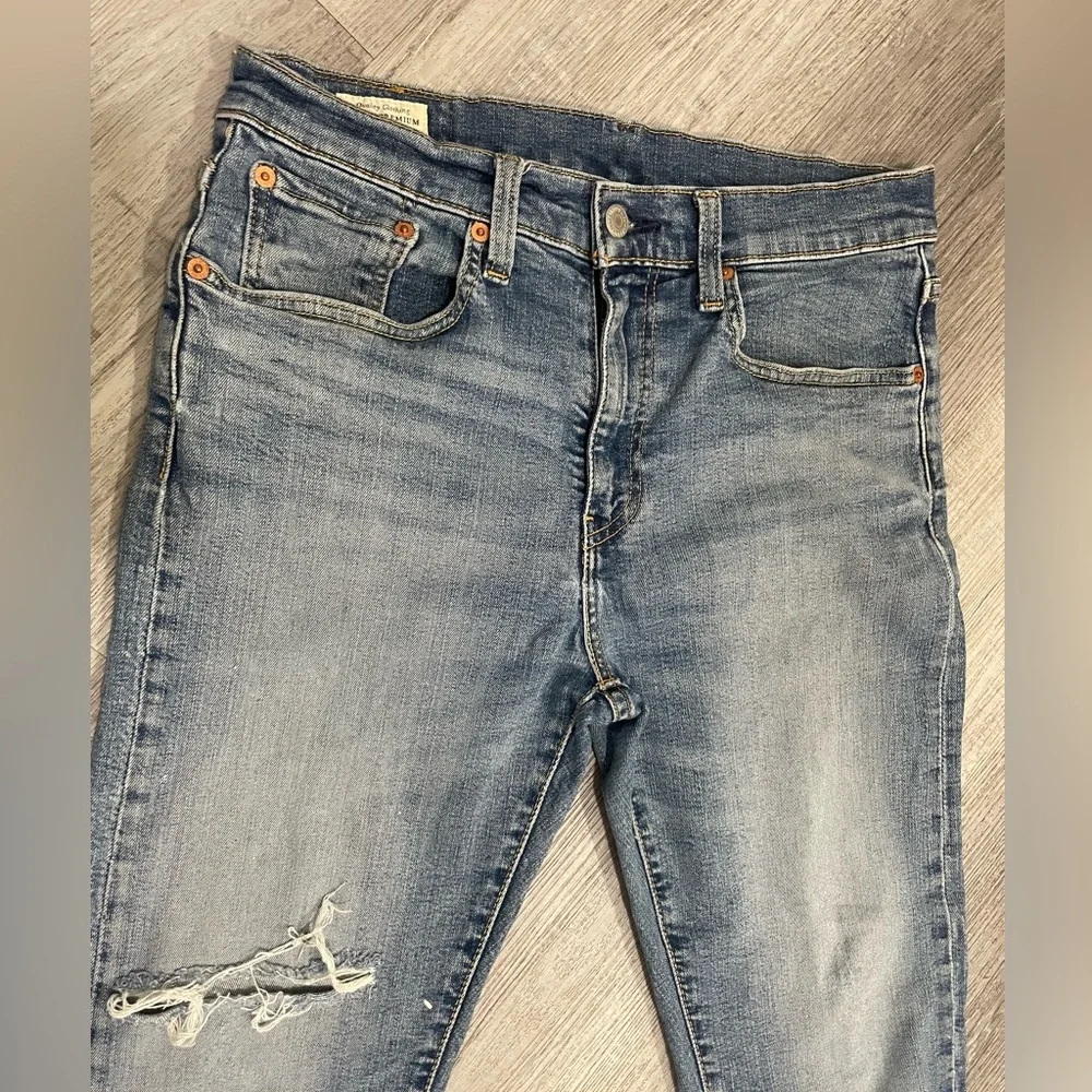 Levi's 502👖Men Premium Taper Fit Jeans with Vintage-Inspired Fading,size 31x32